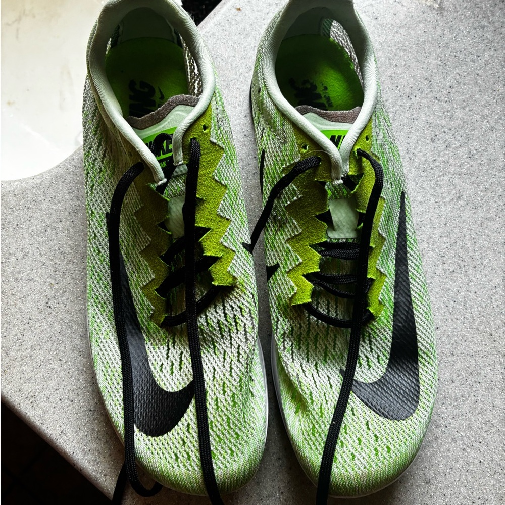 Used like new: Nike Green and Black racing shoes